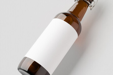 Flip top beer bottle mockup with a blank label, closeup.