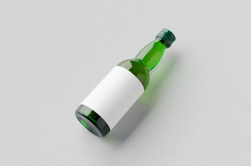 Miniature spirits, liquor bottle mockup. Green glass with a blank label.