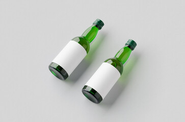 Miniature spirits, liquor bottle mockup. Green glass with a blank label.