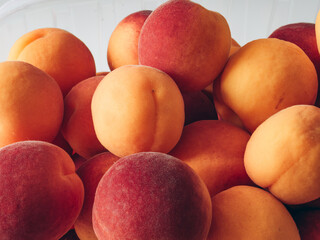 Fresh ripe apricots background. Closeup, top view.