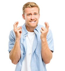 Hope, fingers crossed and portrait of man in studio for winning, excited or luck for bonus. Emoji, gesture and person with hand sign for competition, good news and promotion on white background