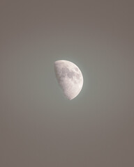 A beautiful half moon in the sky