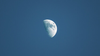 A beautiful half moon in the sky