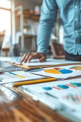 Fototapeta premium Business Professional Analyzing Financial Data and Charts in Modern Office Setting