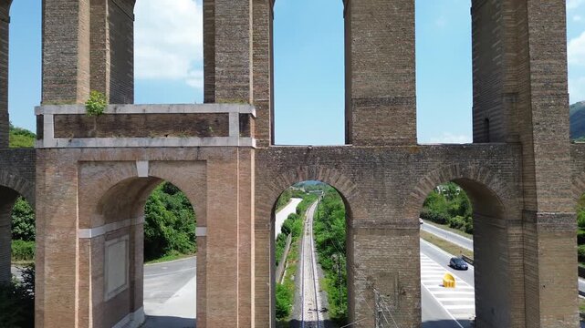 A spectacular aerial view with drones of the Vanvitelli aqueduct built in 1762 near Caserta in the summer lights 8