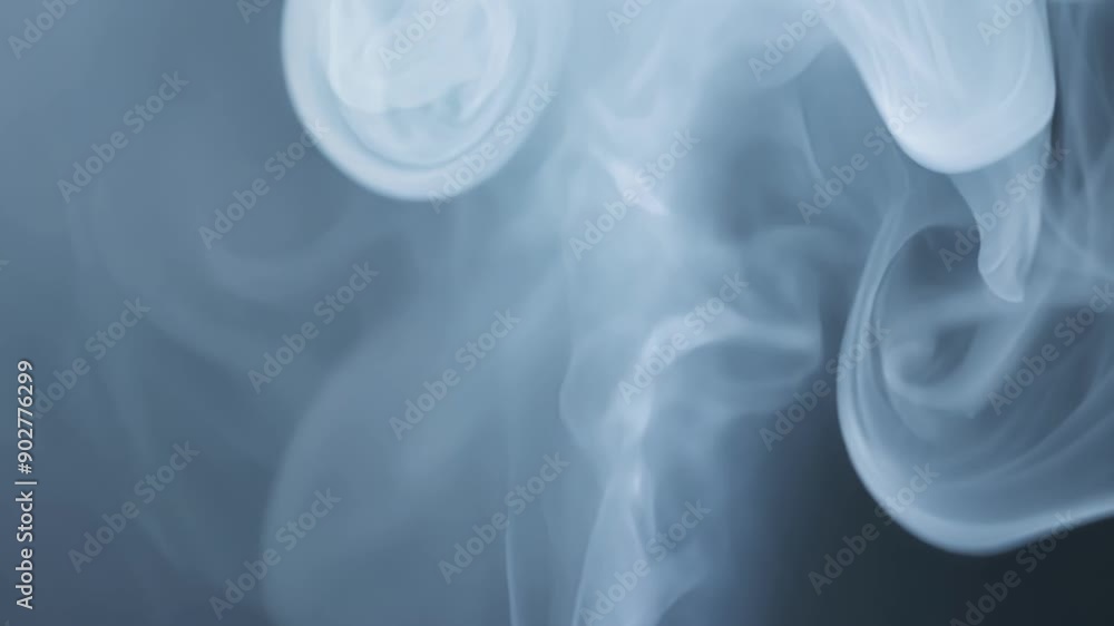 Poster wisps of smoke dance across the screen changing from one form to the next a neverending cycle of bea