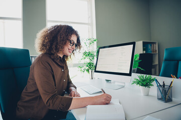 Photo of gorgeous attractive successful woman sit table work business agency workstation office...