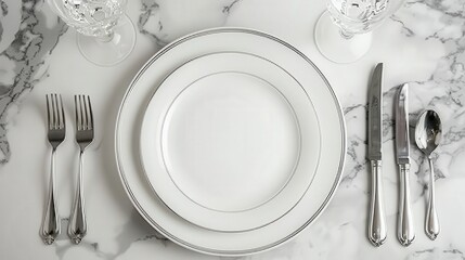 Elegant table setting with silverware on marble table