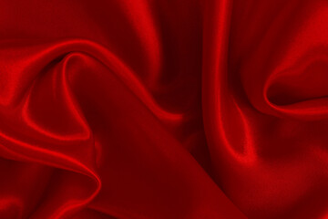Dark red fabric texture background, detail of silk or linen pattern.