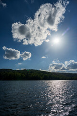 Sunset at Vlasina Lake. Vlasina lake scenery with beautiful clouds in the blue sky. Beautiful semi-artificial lake in Southeast Serbia.
