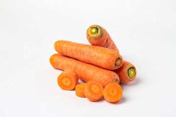 Fresh unpeeled organic carrot, isolated on white background.