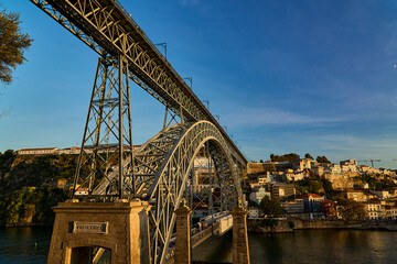 Douro river with famous Dom Luis I Bridge, Porto in Portugal.