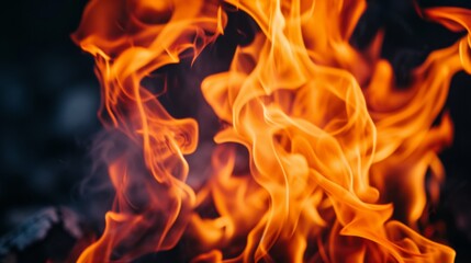 Fototapeta premium Bright orange and yellow fire flame