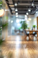 A white potted plant sits on a table in a clean, empty office. The plant is the only object in the room, and it is the only thing that stands out