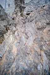 A beautifully textured rock surface set in a stunning natural environment or setting