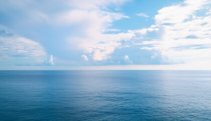 Fototapeta premium a beautiful blue sea with clouds. background, concept of calm and relaxation , high resolution