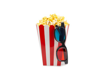 Tasty popcorn in buckets and cold cola drinks with cinema tickets, movie clapper and 3D eyeglasses...