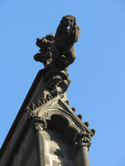 Gothic Cathedral of Clermont-Ferrand built with black stone of Volvic. 13th century. Auvergne. France. Detail of gargoyle.