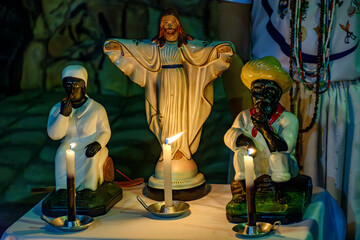 Religious altar with images representing the entities, deities and sicretism of Umbanda in Brazil © Fred Pinheiro