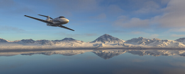 Private Jetplane Flying over the Clouds and Landscape Background at Sunset.
