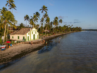 Obraz premium Aerial photo of São Benedito Church at Praia dos Carneiros in the city of Tamandaré, state of Pernambuco, Brazil