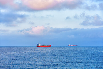 Tranquil Seascape with Ships in Tarragona at Sunset