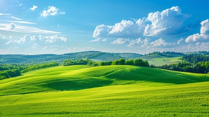 Fototapeta premium A picturesque landscape with rolling green hills and a clear blue sky, ideal for a billboard advertisement promoting outdoor activities.