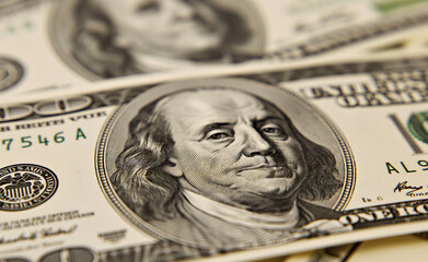 Close-up of one hundred dollar bills.