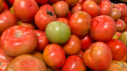 Fresh tomatoes background. Group of tomatoes.