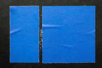 Blue poster with folds close-up.