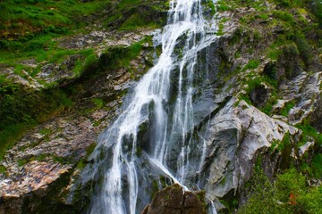 Ireland Powerscourt Waterfall. Cliffs with waterfall. 