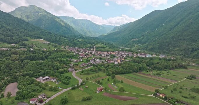 Aerial view Seren del Grappa Italy. Urban landscape of old historical houses at the foot of the Dolomite Alps. High quality 4k footage