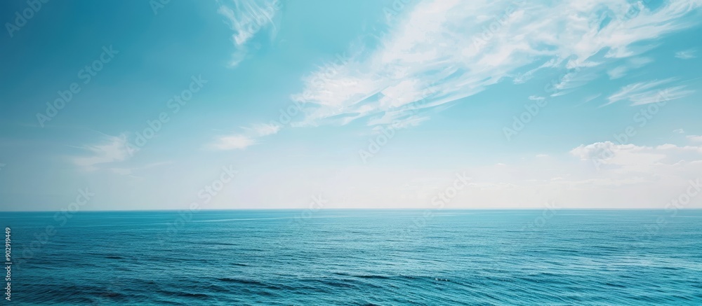 Aufkleber Scenic view of the sea and sky meeting at the horizon with a clear blue color palette in the copy space image