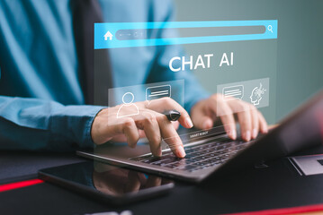 Ai chat bot with customer help modern business. Businessman use computer open chat Ai application,...