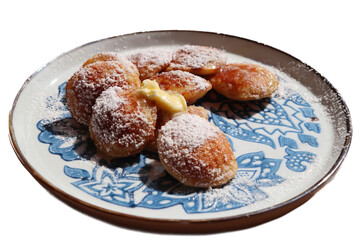 A plate of poffertjes