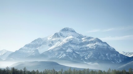 Obraz premium A mountain range covered in snow with a clear blue sky in the background