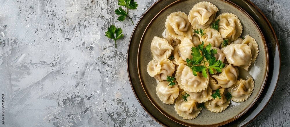 Aufkleber russian style pelmeni ravioli and dumplings with meat on a plate with a light concrete background su