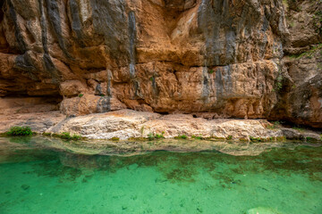 View of a stretch of the impressive Ebron river strait, Teruel, Aragon, Spain, between high rock walls and turquoise and transparent waters