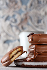 chocolate chip cookies with milk on the table