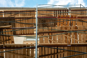 scaffolding at the building where the facade is being repaired