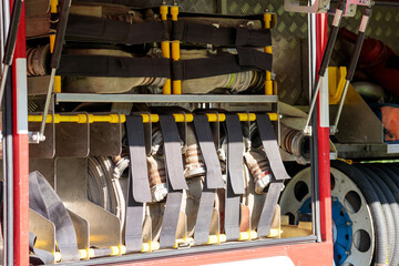 A fire truck with a red door and a blue wheel