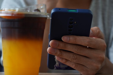 person holding a glass of water