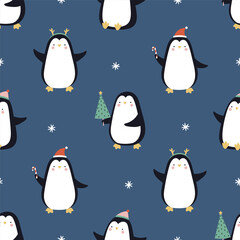 Seamless Christmas pattern with funny penguins on a blue background.