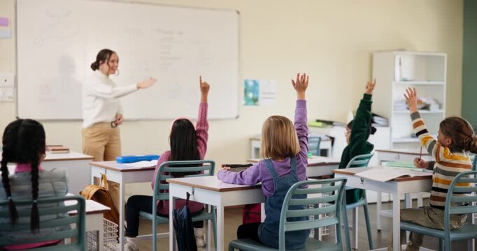 Questions, education and students in classroom for learning, development or growth as youth with math. Hands up, teacher and children in kindergarten or school for knowledge, study or problem solving