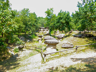 Mushroom shaped geological rock formations in the Ciciu del Villar Nature Reserve Park, Villar San...