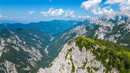 A stunning view of Slemenova Špica, showcasing a picturesque hiking trail in the Slovenian Alps....
