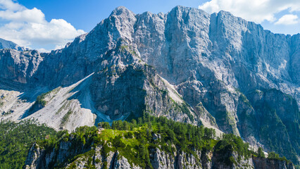 A stunning view of Slemenova Špica, showcasing a picturesque hiking trail in the Slovenian Alps. The image, captured from the air by a drone, highlights the breathtaking landscape, with rugged peaks  © Viktor