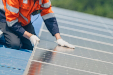 Worker Technicians are working to construct solar panels system on roof. Installing solar...