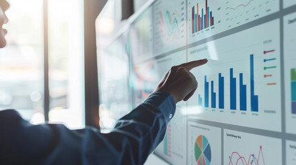 Person presenting innovative ideas with interactive charts at a business meeting in the afternoon