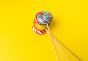 Color lollipop, spiral candy on stick, colorful striped lollypop, round fruit caramel, circle...